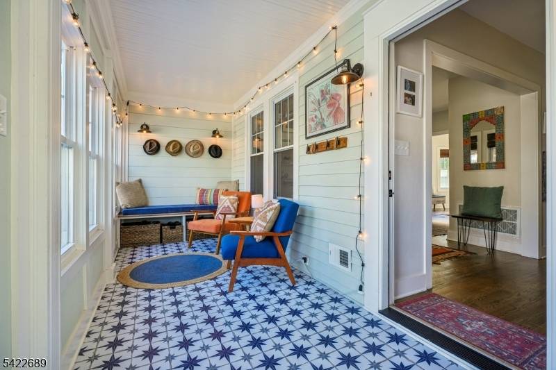 Nestled on a tree lined street, this beautifully renovated 4 bedroom, 3.