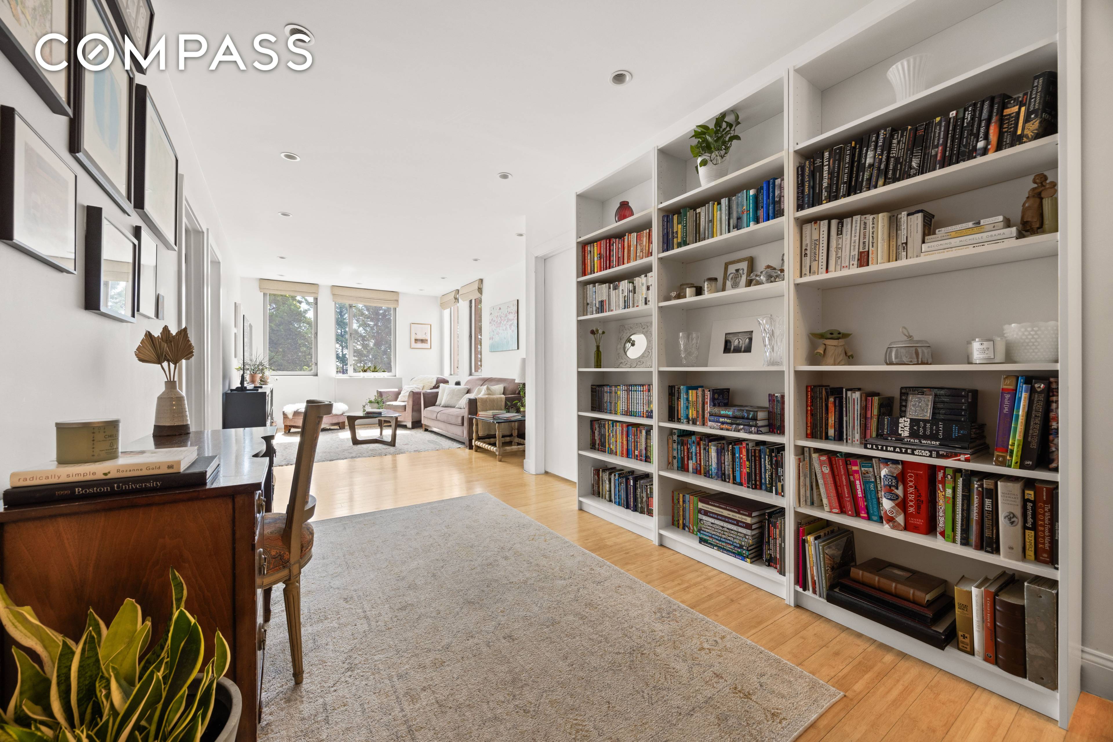 Stunning, sunny and spacious two bedroom condo with an incredible chef's kitchen, complete with a private balcony and it's own deeded parking spot !