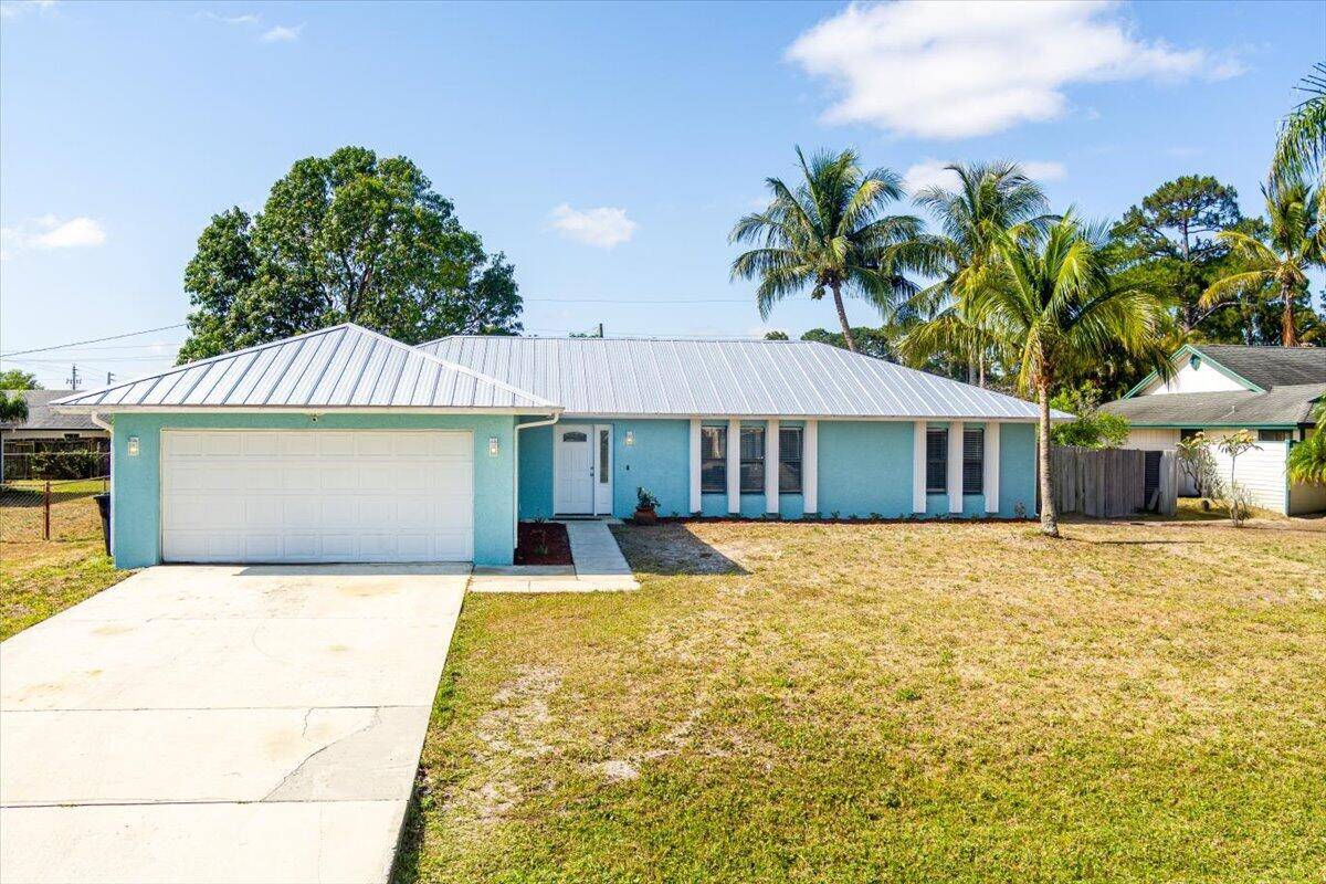 Sturdy metal roof installed in 2023 provides long lasting protection and peace of mind !