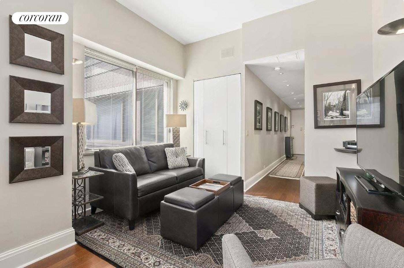Residence 6K at 350 West 50th Street is an extraordinary loft like sunny corner, mint renovated studio with soaring high ceilings, eight over sized window panels facing East and South, ...