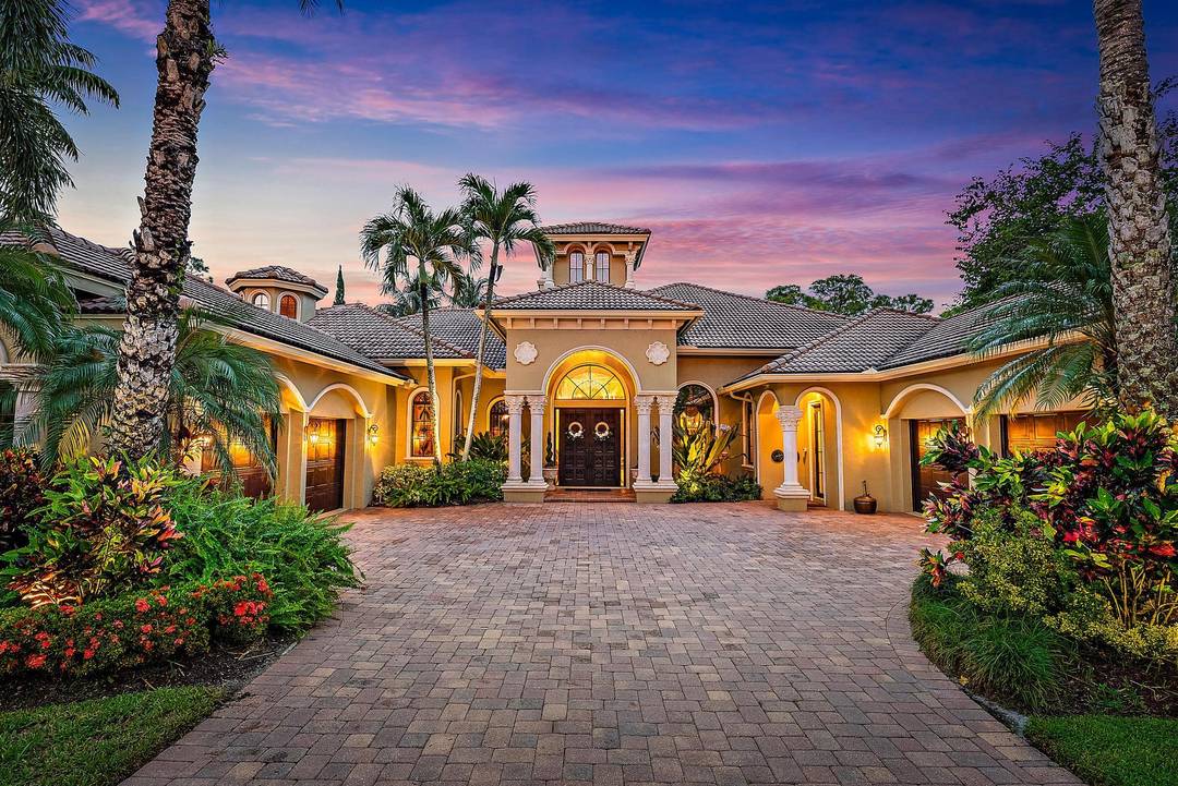 This extraordinary single story estate in prestigious Bay Hill Estates offers the ultimate blend of timeless craftsmanship and modern convenience.