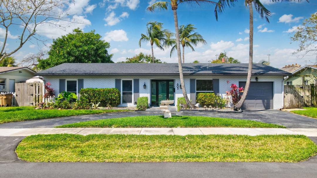 Welcome to this beautifully maintained 3 bed, 2 bath single family home in the heart of Deerfield Beach featuring a flexible additional room perfect for a home office, gym, media ...