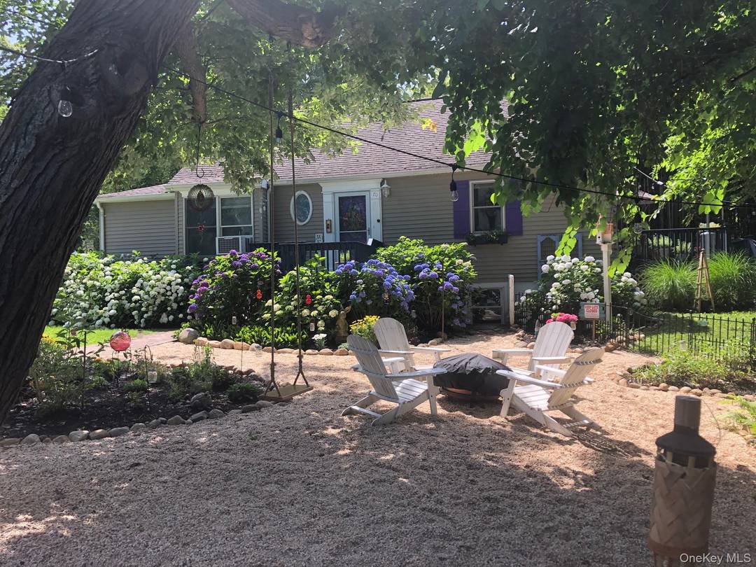 Welcome to this open concept Cape Cod nestled in a desirable North Shore beach community offering the ultimate coastal lifestyle with access to three private beaches, a clubhouse, beach parties, ...