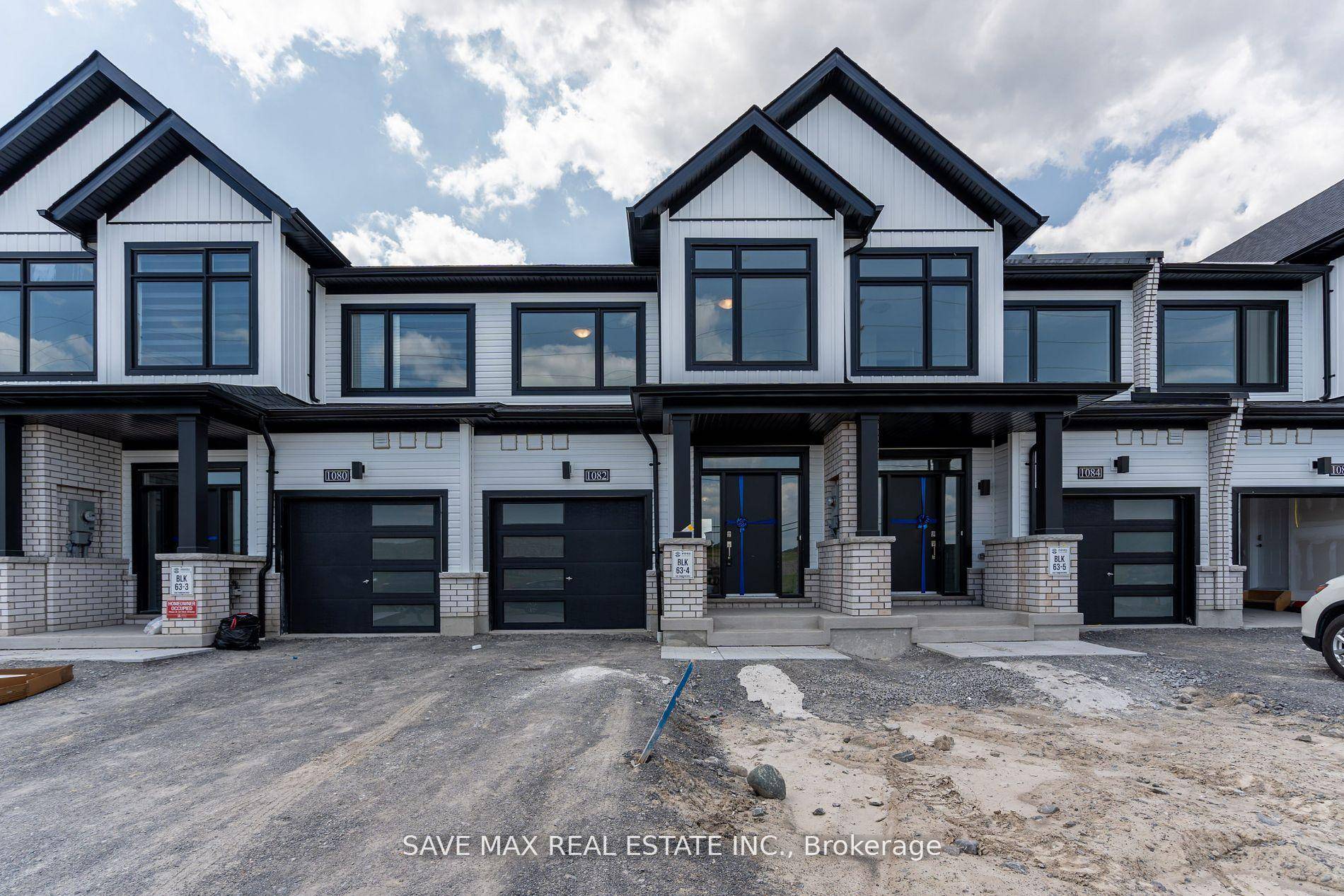 This stunning townhouse boasts an impressive open concept design, featuring 2000 sqft of living space, including a fully finished basement.
