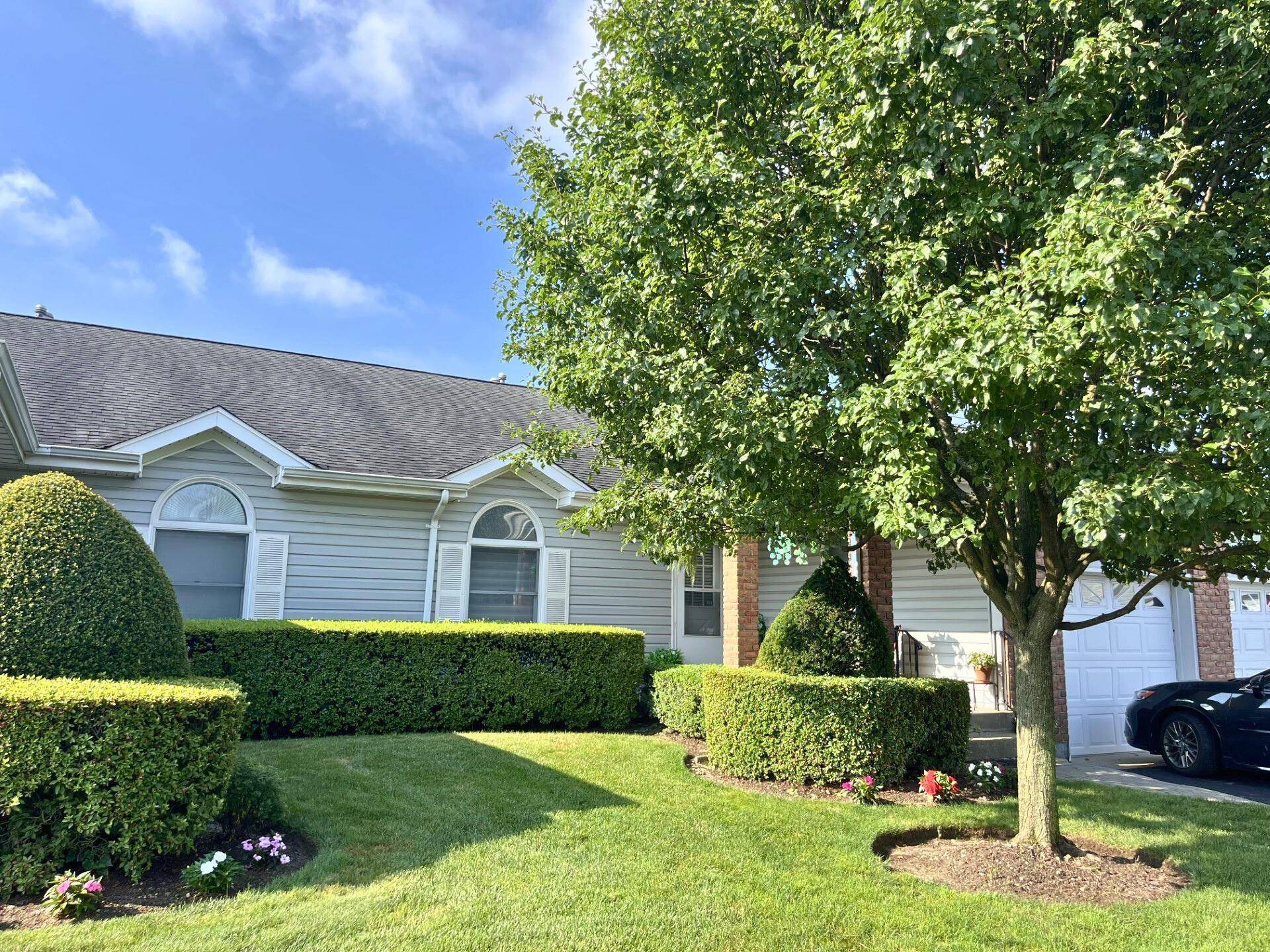 Bright 2 Bed, 2 Bath Condo in Peaceful 55 Community Well kept first floor condo with open concept living, dining, and kitchen.