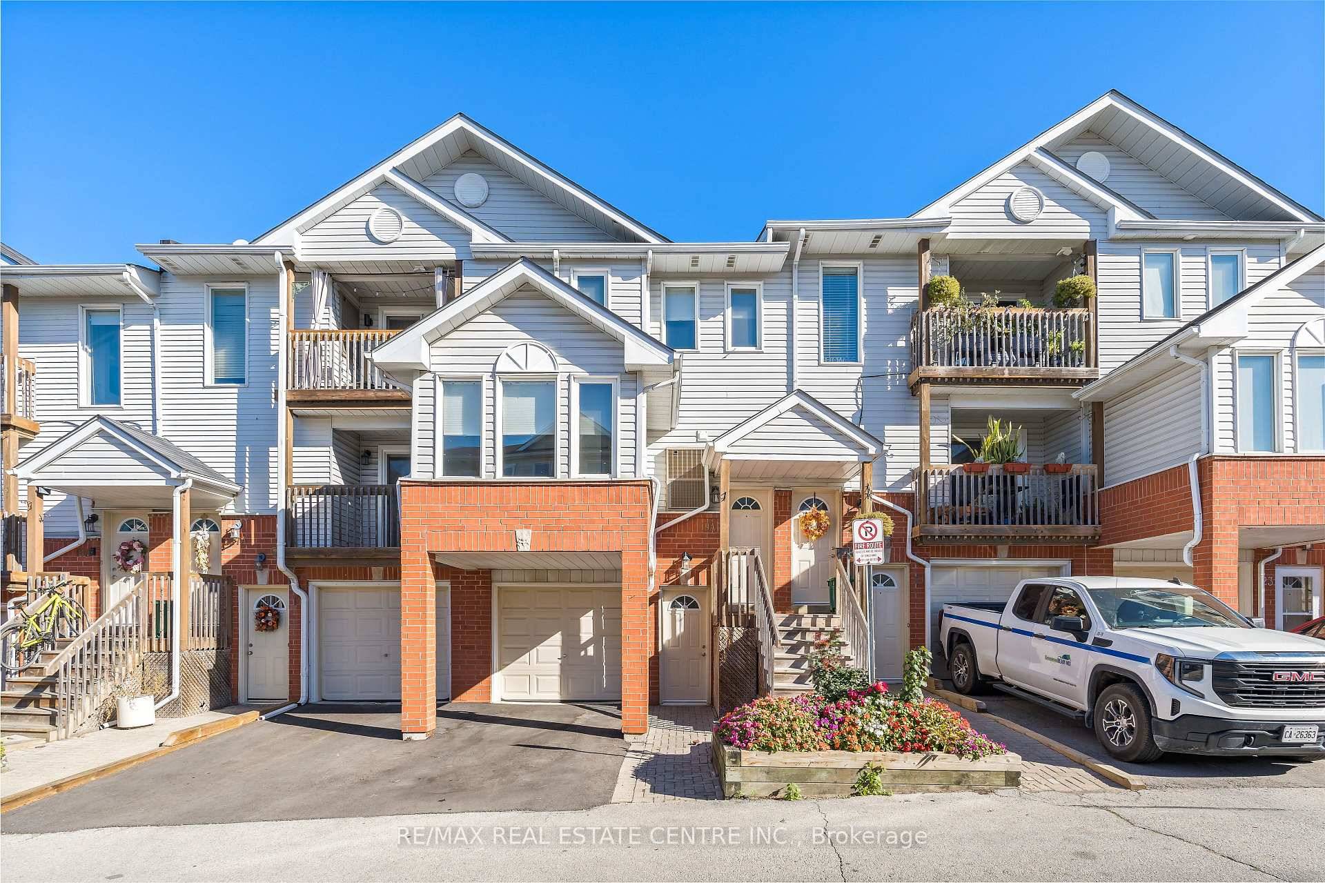 In a family friendly neighbourhood, in the heart of Georgetown, you will uncover this charming 2 bedroom, 1 bathroom stacked condo townhome.