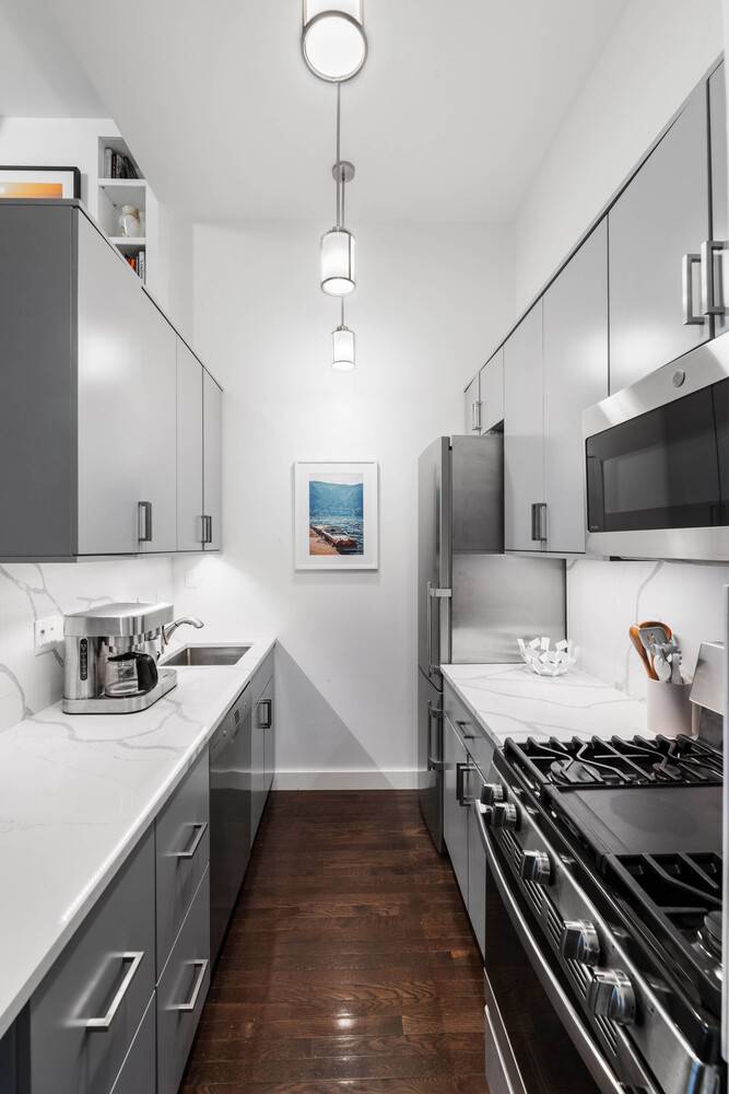 Embrace the essence of Greenwich Village LOFT living in this charming SOUTH facing 1 bedroom that has been meticulously renovated to preserve its character while offering modern comfort.