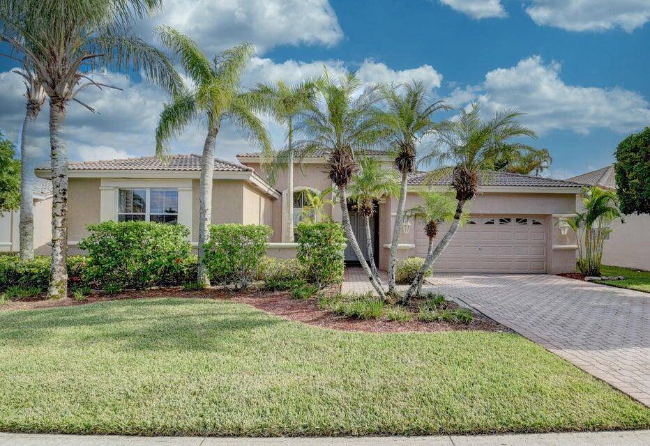 Discover this beautifully updated 4 bedroom, 3 bath retreat in The Shores, where natural light and soaring ceilings create an inviting atmosphere.