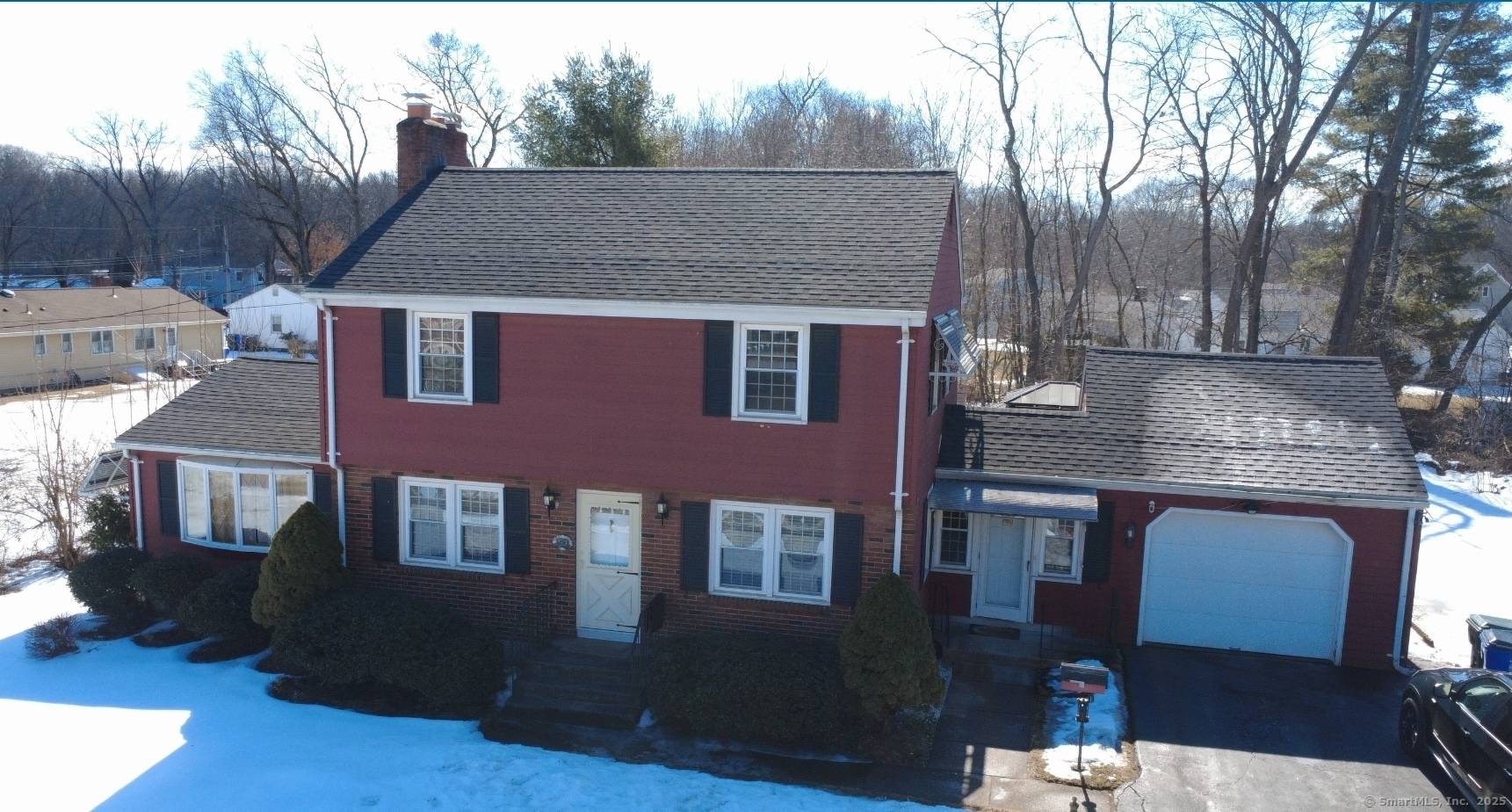 Welcome to 33 Spruce Drive a beautifully maintained home nestled in a quiet, established neighborhood in East Hartford.