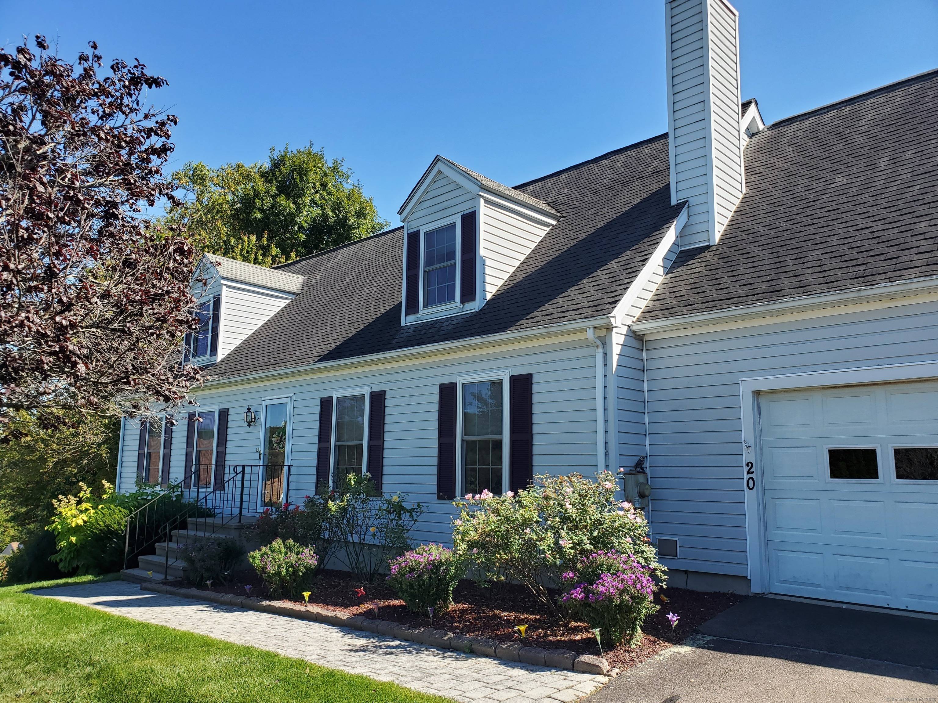 Charming Cape set in picturesque small New England Town close to all with train station access to New Haven then to New York or Boston.