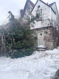 Investment Opportunity ! Zoned for 2 Family.