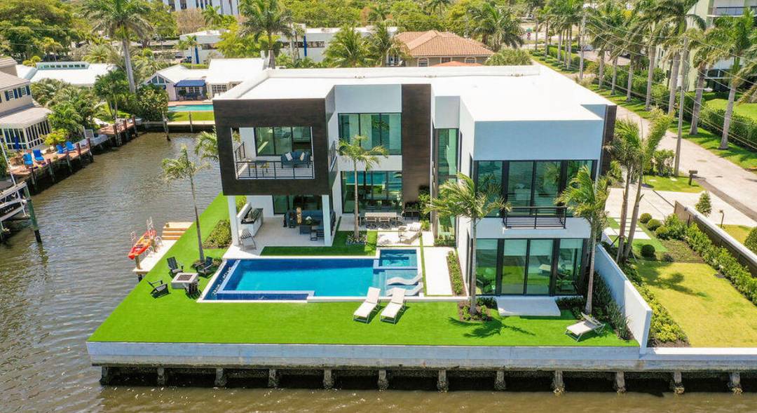 Experience luxury living at this exquisite 5 bedroom, 5 bathroom residence on a spacious corner lot in Delray Beach.