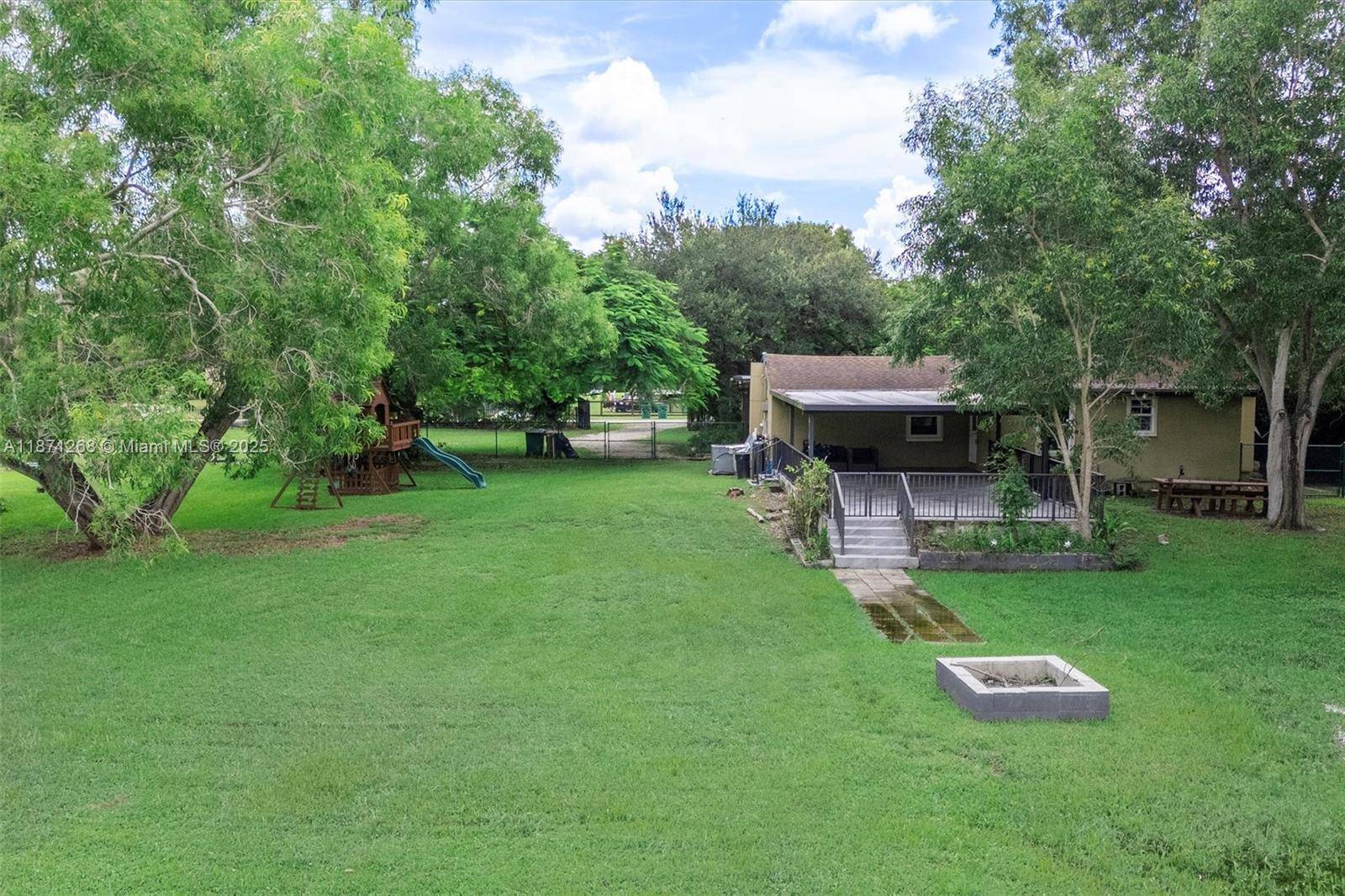 Exceptional 1. 26 acre property in Davie with endless potential !