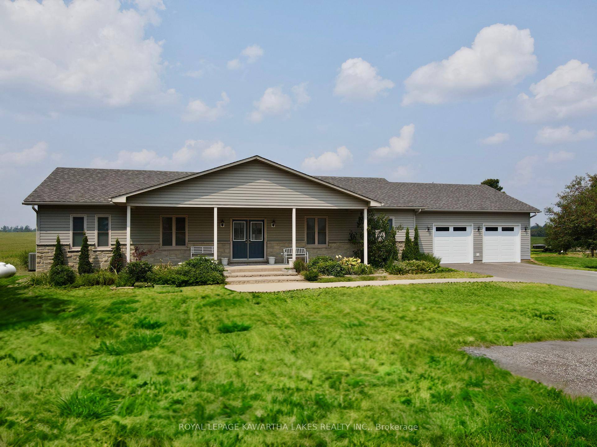 Set on a quiet public road and surrounded by scenic farmland, this beautifully maintained 2 1 bedroom, 4 bath bungalow sits on a private, nearly 1 acre lot and offers ...