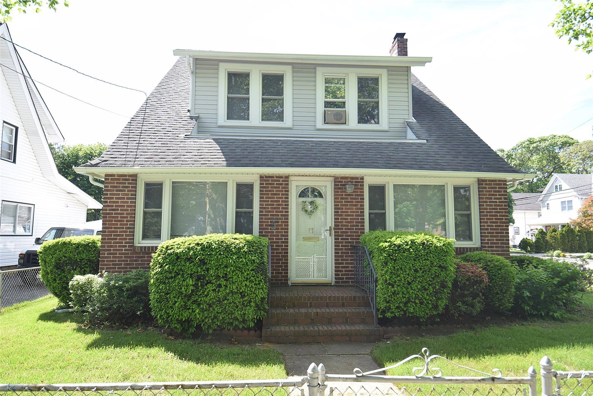 Spacious home with oversized property, well maintained, single owner occupant for over 60 years, close walk to stores, schools, and train station.