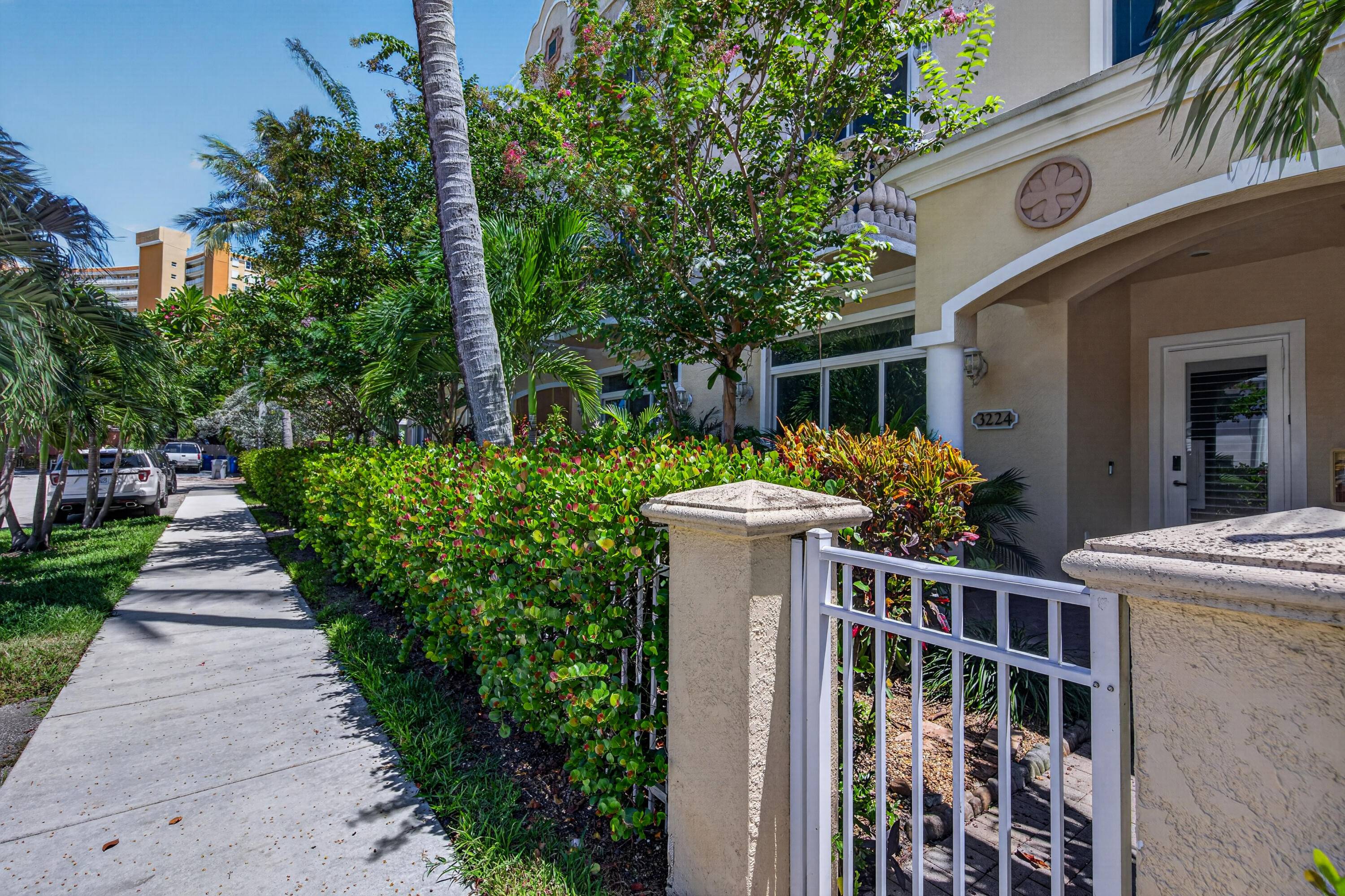 RARE OPPORTUNITY ! Discover luxury coastal living in this stunning, fully renovated four level townhome in the sought after Ocean Park Estates.