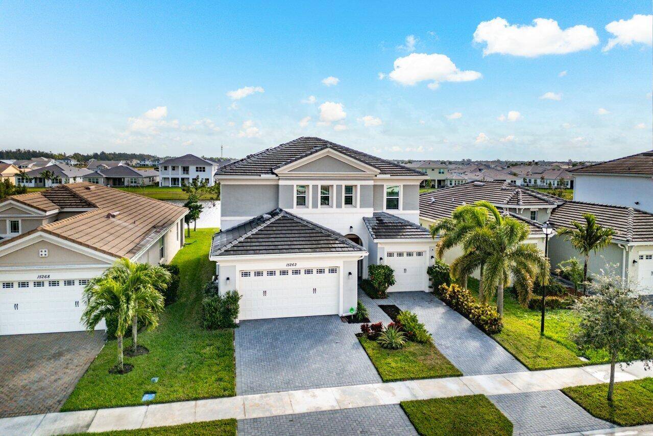 This exquisite 3 bedroom LOFT 3 car garage Azalea model is perfectly nestled, on a picturesque lakeview lot within the sought after Meadows community of Westlake.