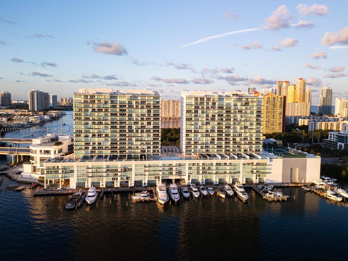 Experience true luxury in this one of a kind, stunning 2 story condo, offering breathtaking views of the Intracoastal, Oleta River Park, and the Ocean.