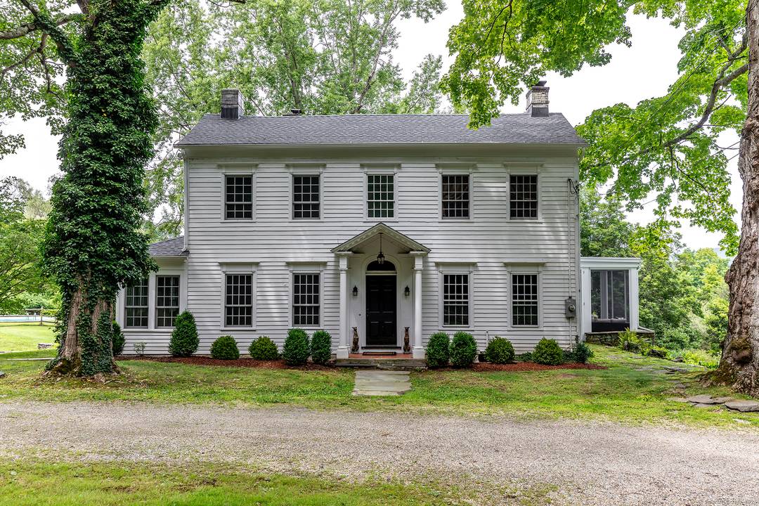 17k June 2026 Only. Chic and Updated Georgian Colonial with Gorgeous Views, Set Back On A Bucolic Country Road in a Coveted Location.