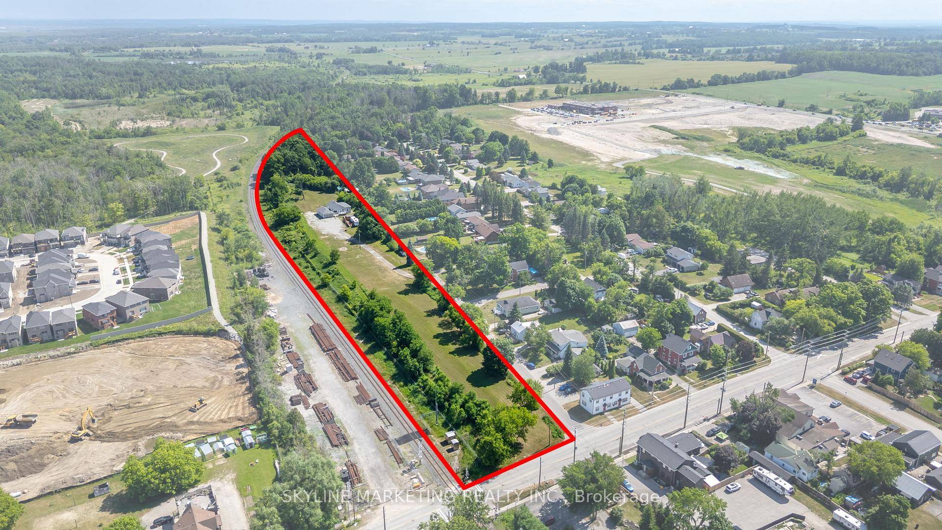 Welcome to 871 Front Street a beautifully renovated raised bungalow situated on nearly 5 acres, offering a rare blend of residential comfort and commercial potential in the heart of Lefroy.
