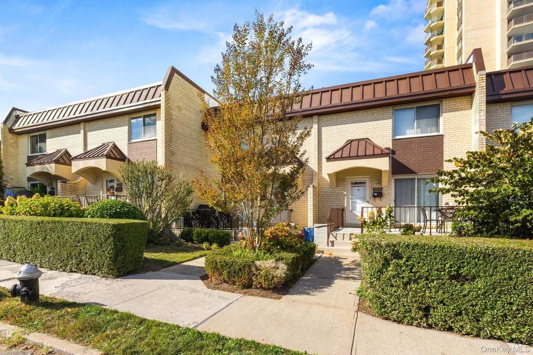 Introducing a beautifully appointed townhouse in the distinguished Towers at Water s Edge community at 215 15 23rd Ave, nestled in the heart of coveted Bay Terrace, Bayside.