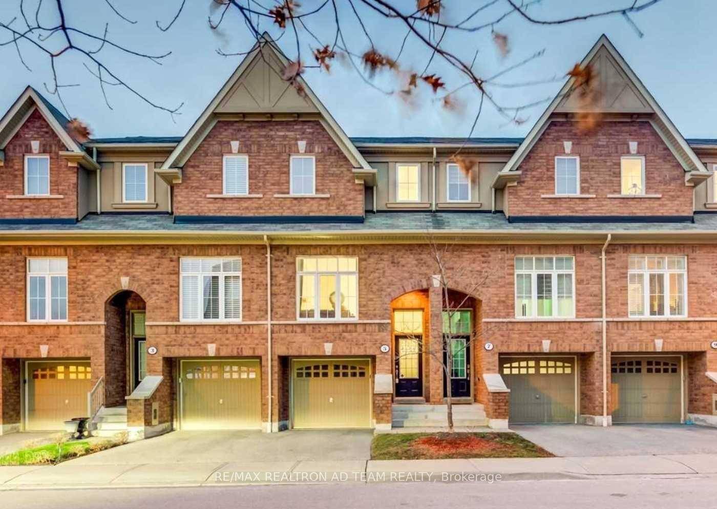Stunning Executive Townhome Located In The Upscale Tribute Imagination Community.