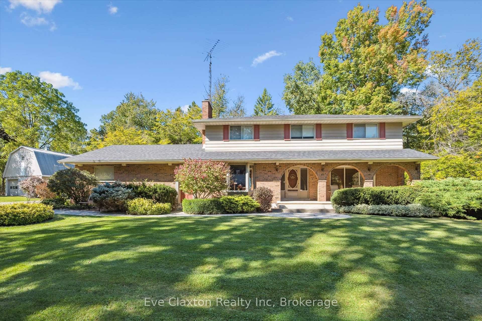 Welcome to this exceptional country retreat perfectly situated on a beautiful, treed 12.