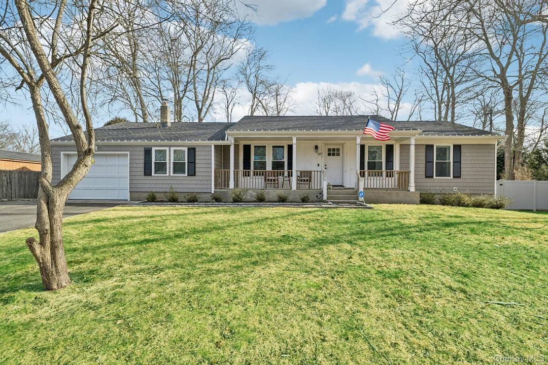 Welcome to 65 Beachfern Road, a charming and newly updated sprawling ranch nestled in the heart of Center Moriches.