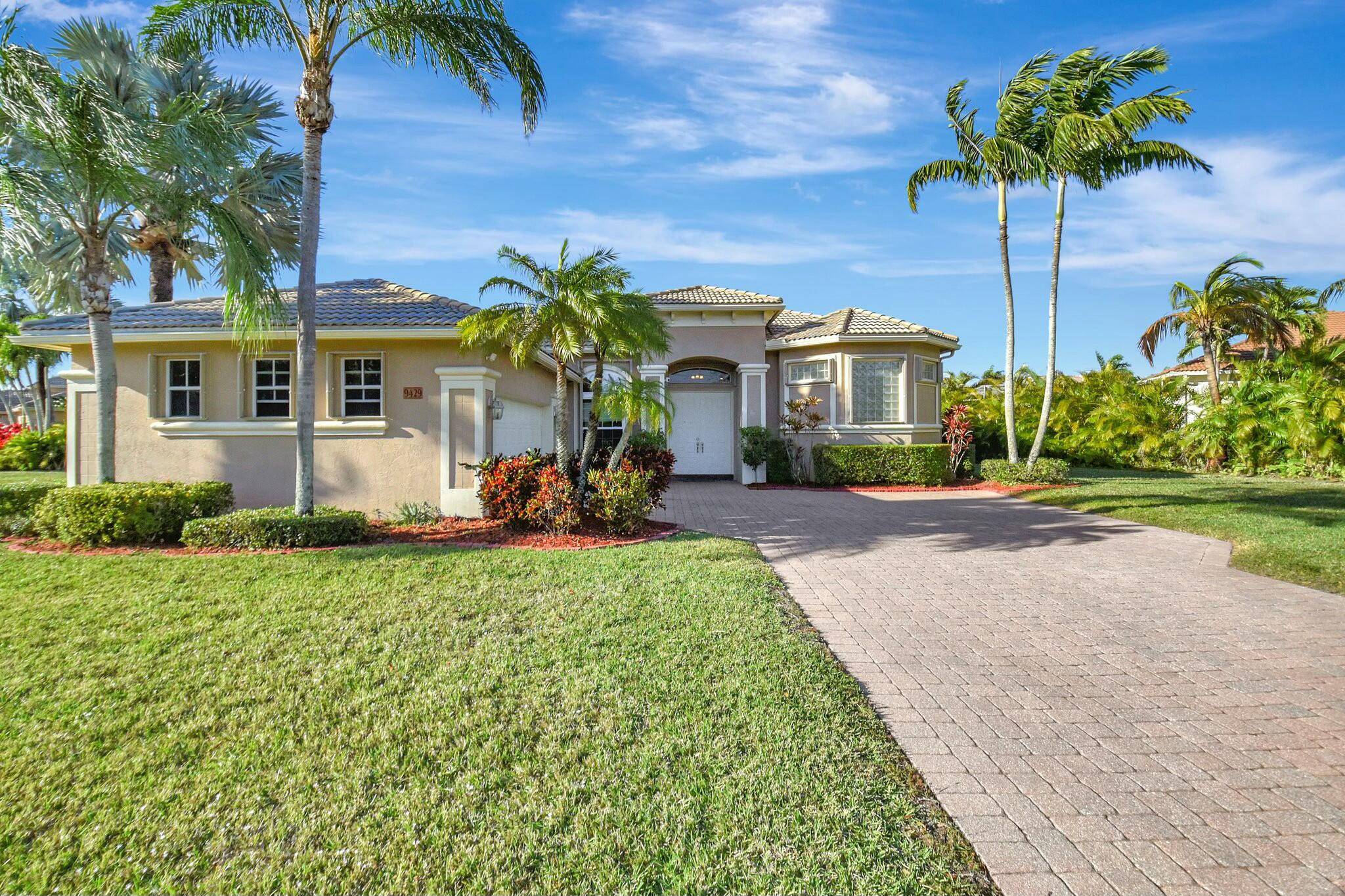 Elegant Lakefront Home on Rare 1 3 Acre Lot in Baywinds' Exclusive Estates Section.