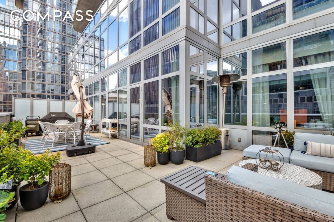 Stunning mint condition townhouse style duplex glamorously set within the amenities of a luxury condominium tower.