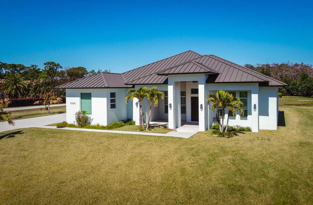 This BRAND NEW luxury CBS home located on a 1.