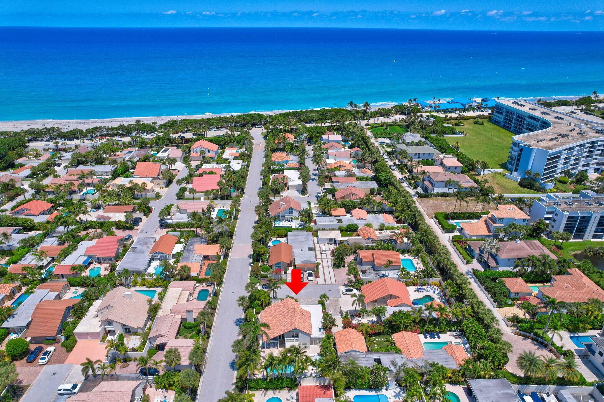 Beautifully expanded thoughtfully upgraded home just steps from the beach in Jupiter's gated community of Ocean Walk.