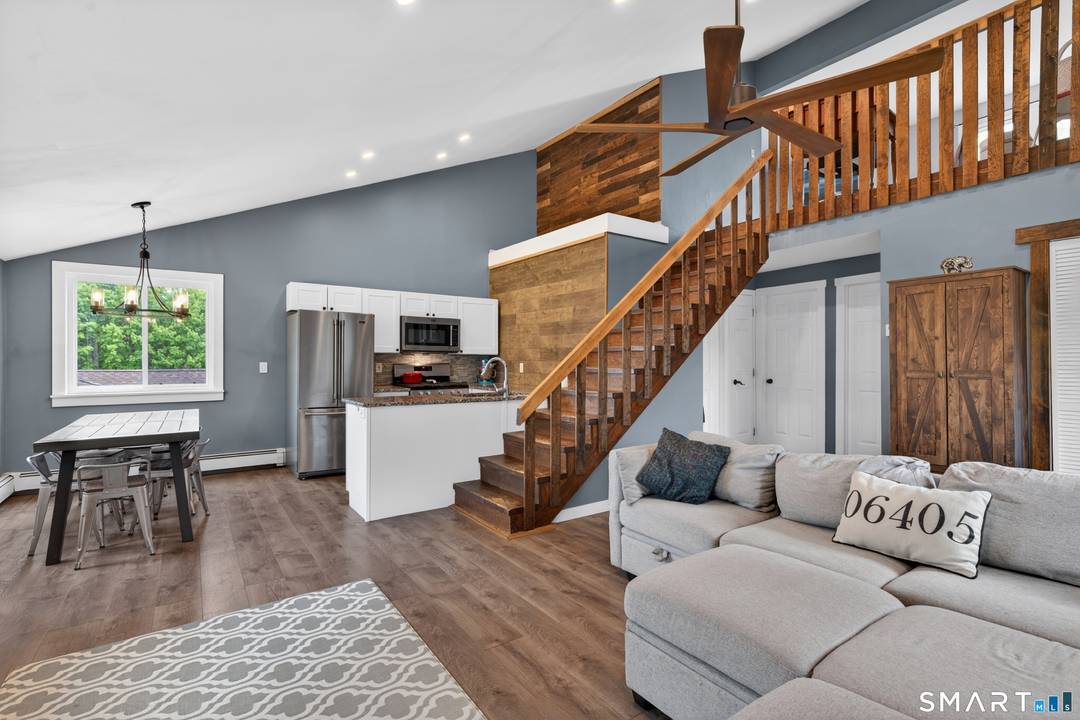Welcome to 68 Ivy Street, a beautifully updated two family home steps from the heart of Branford Center.