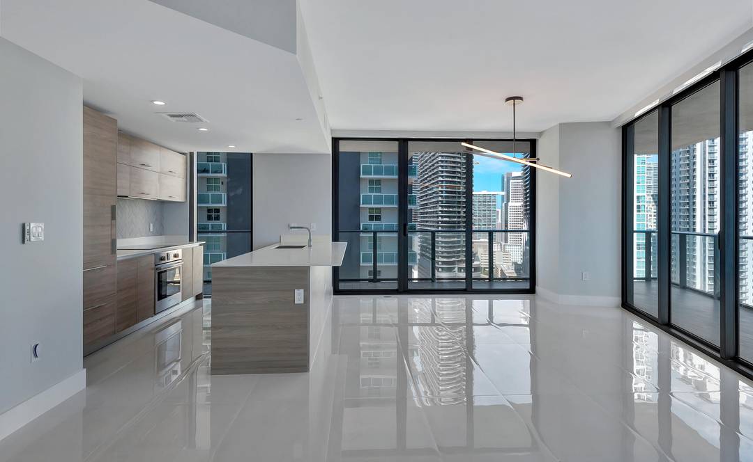 Desirable corner 2 bedroom den on the 24th floor of SLS Brickell with abundant natural light and stunning skyline and water views throughout the expansive floor to ceiling windows.