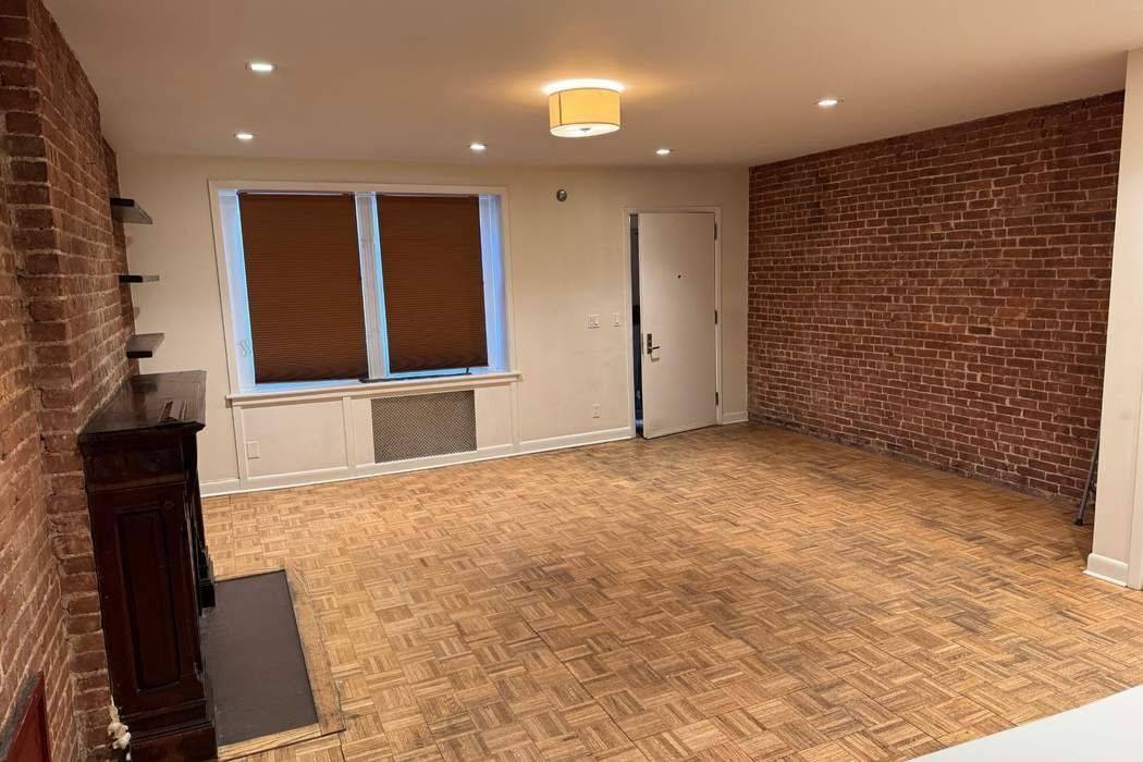 Gorgeous large one bedroom floor through apartment with private backyard and washer dryer in unit.