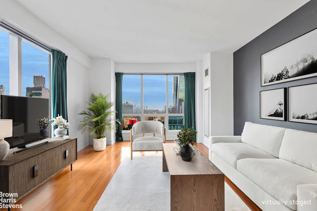 Set high above Midtown with sweeping skyline views and exceptional corner light, Residence 38E at The Orion is the largest and most desirable one bedroom layout in the building.
