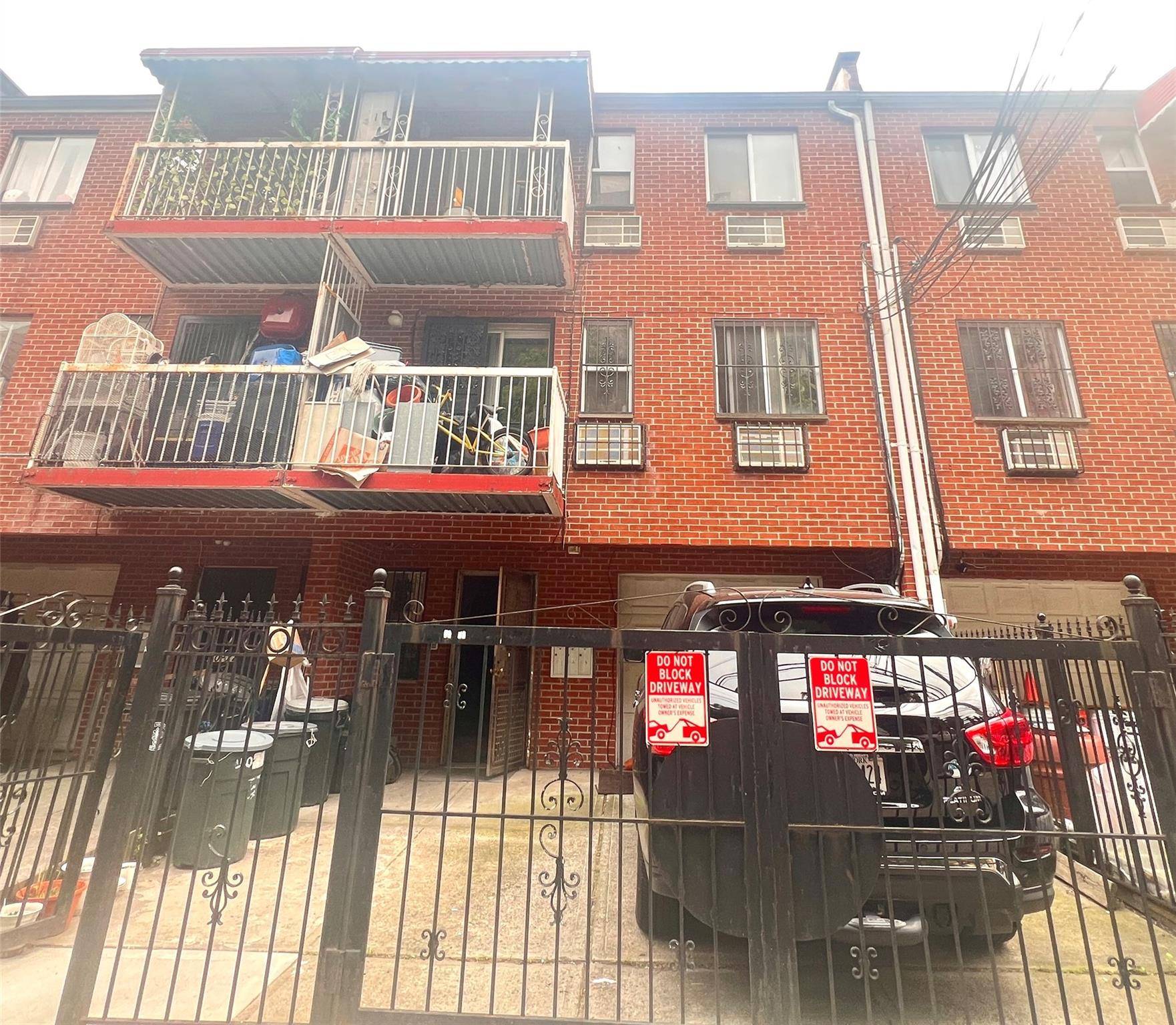 Legal 3 dwelling brick house located in the heart of Elmhurst, built in 1999.