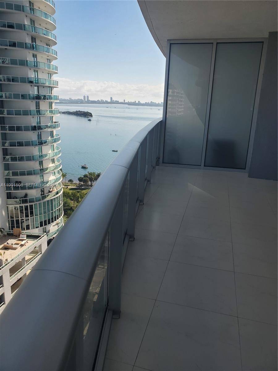 Beautiful 1 bedroom, 1. 5 bath residence at Aria on the Bay offering a bright, open layout with floor to ceiling windows and stunning city and bay views.