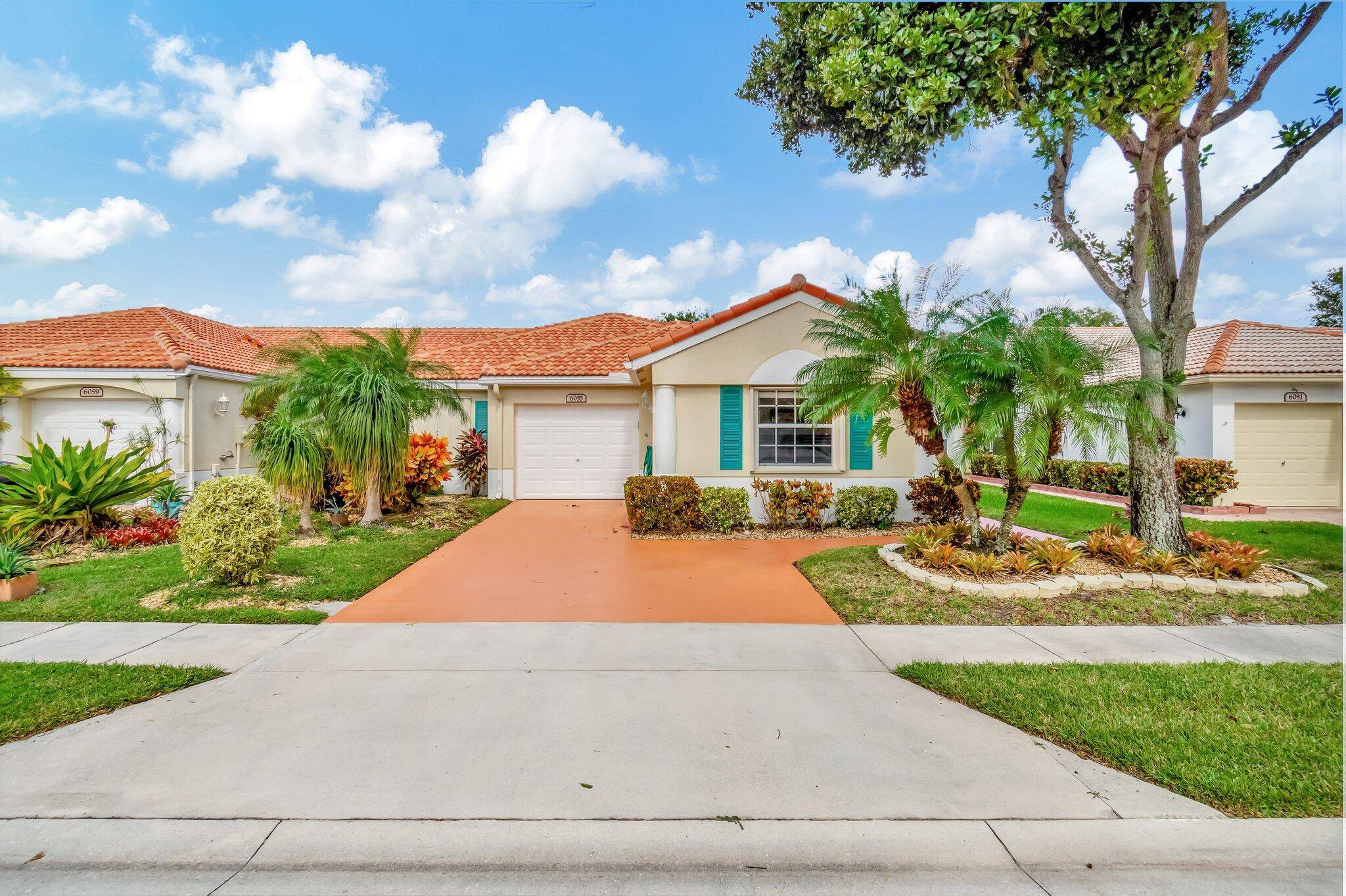 Introducing 6055 Caladium Road, a remarkable lakeside property situated in the heart of the thriving community of Delray Beach, Florida.