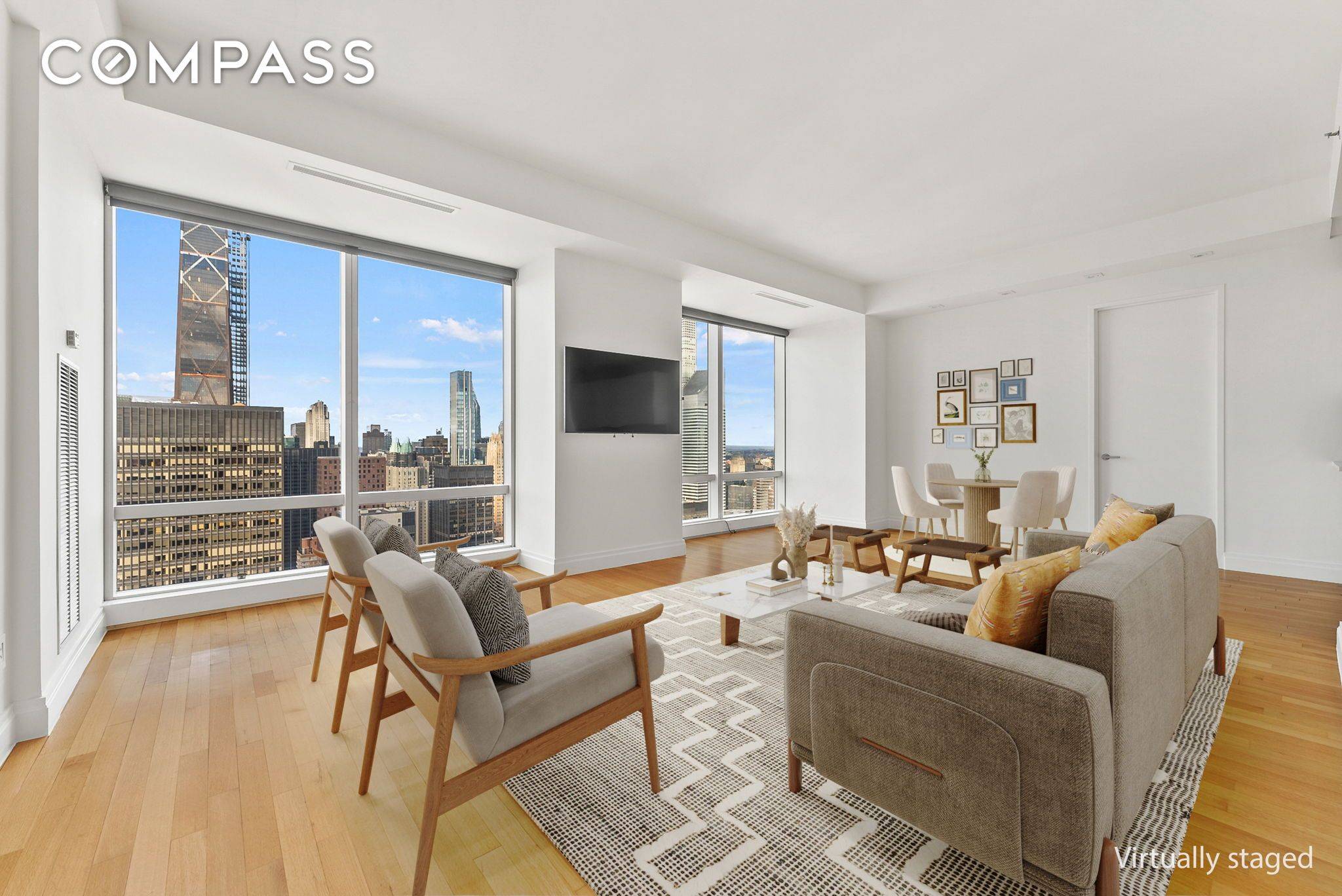 Perched on the 63rd floor, this beautifully renovated split two bedroom, two and a half bathroom residence offers breathtaking panoramic views of the iconic New York City skyline.