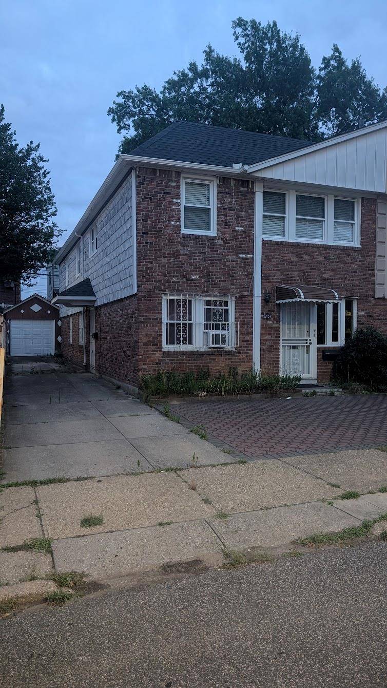 Two family semi detached in the Dynamic neighborhood of Oakland Gardens in Bayside.