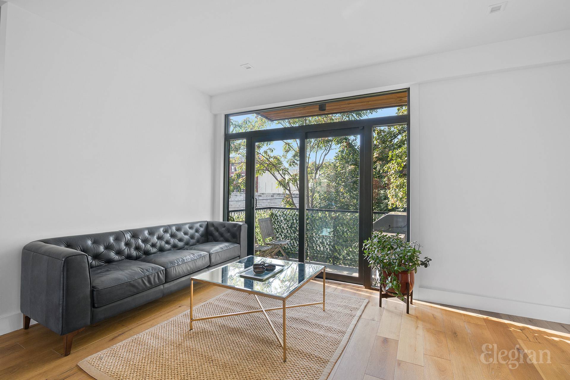 You will fall in love with this 1900 sq ft bright and welcoming duplex flooded with light from both East and West exposure.