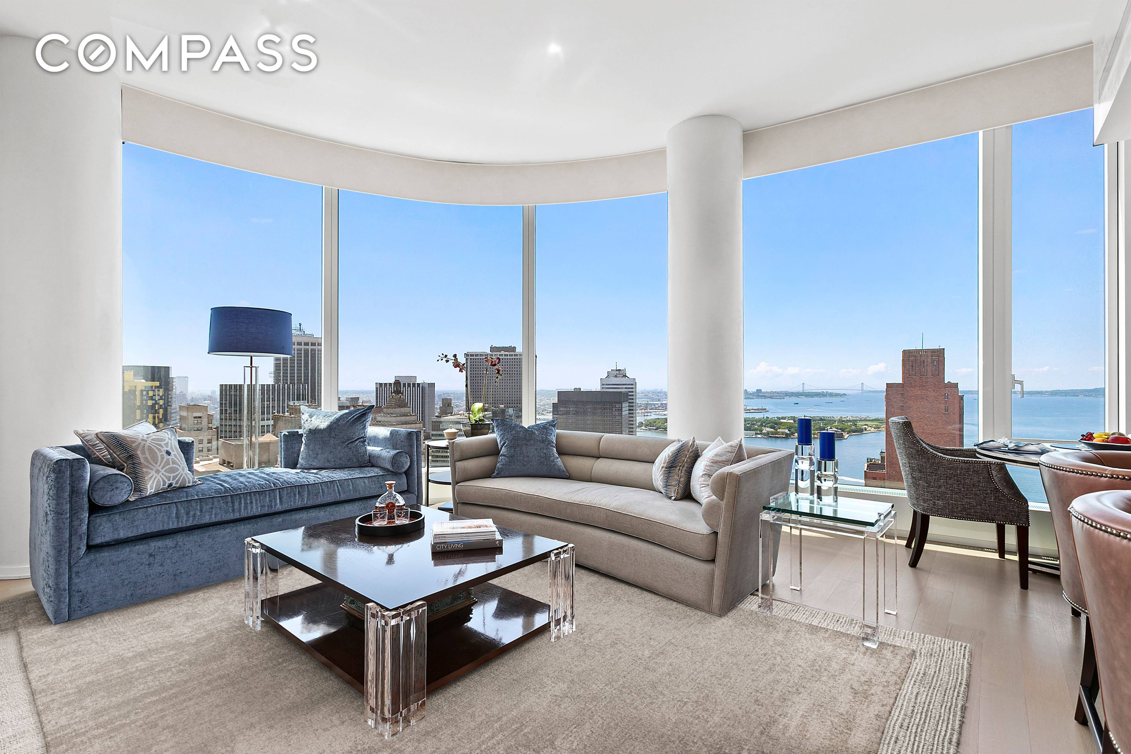 Majestic water views unfold at your feet in this unparalleled two bedroom, two and a half bathroom showplace perched high on the 45th floor at 50 West, an exemplary full ...