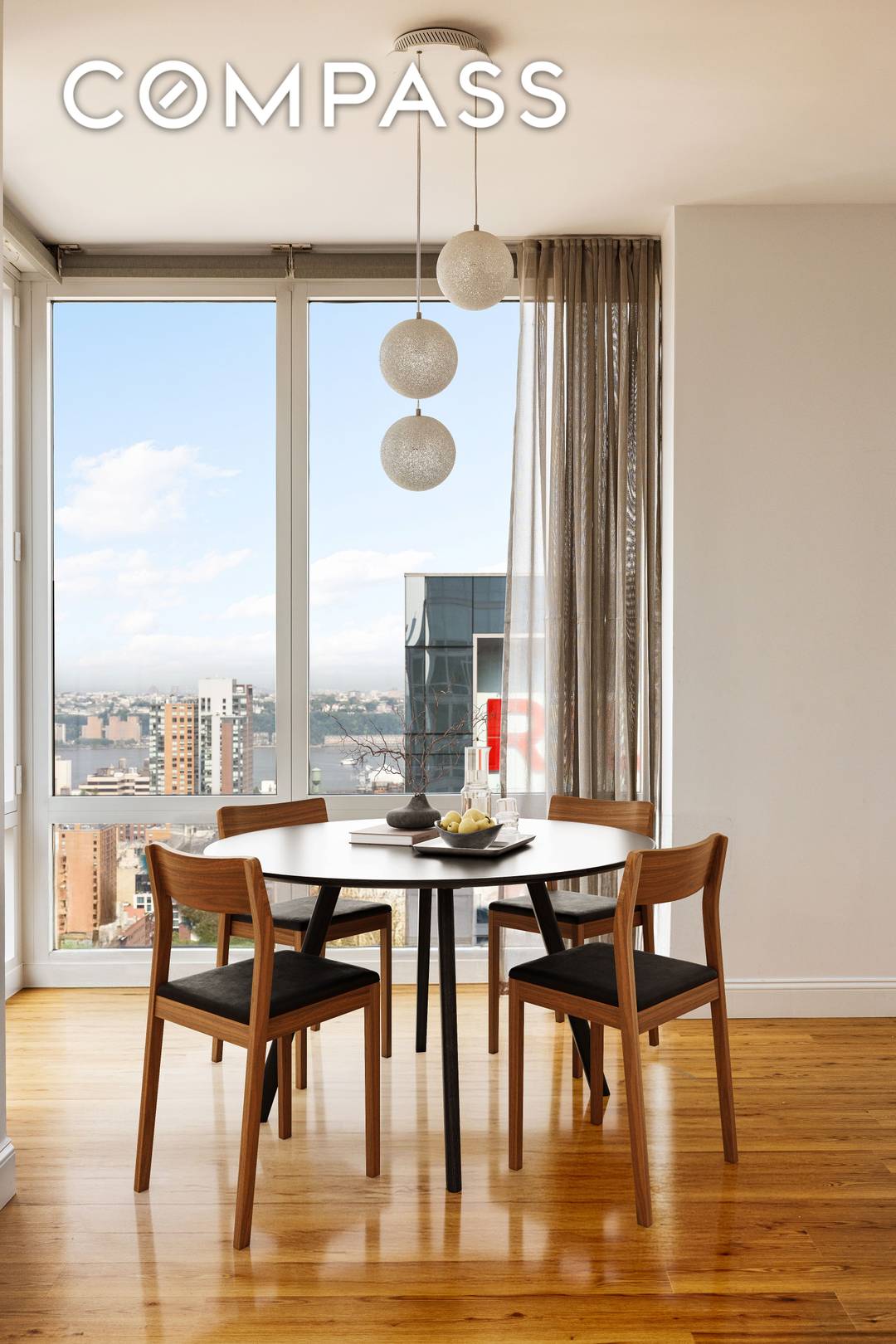 Perched on a high floor at The Platinum, Residence 3103 is a thoughtfully designed two bedroom, two and a half bath corner apartment with expansive southern and western exposures.