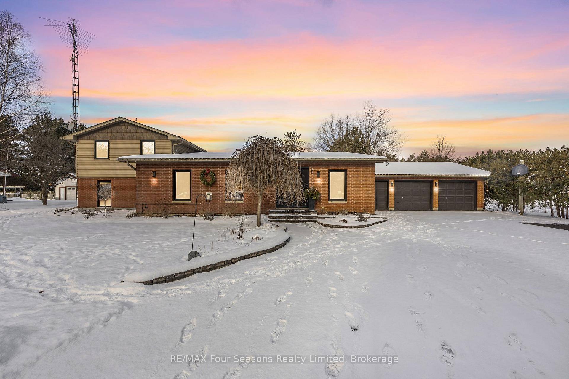 Welcome to 6184 County Road 9, a stunning 4 1 bedroom, 3 bathroom split bungalow on a picturesque 1 acre lot.