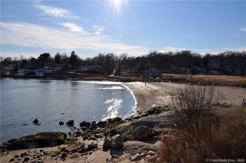 ACADEMIC YEAR 2026 2027 GUILFORD BEACH RENTAL Fully furnished beach home set up above Mulberry Point Road with AMAZING VIEWS OF LONG ISLAND SOUND, just steps from DANIEL AVENUE BEACH.