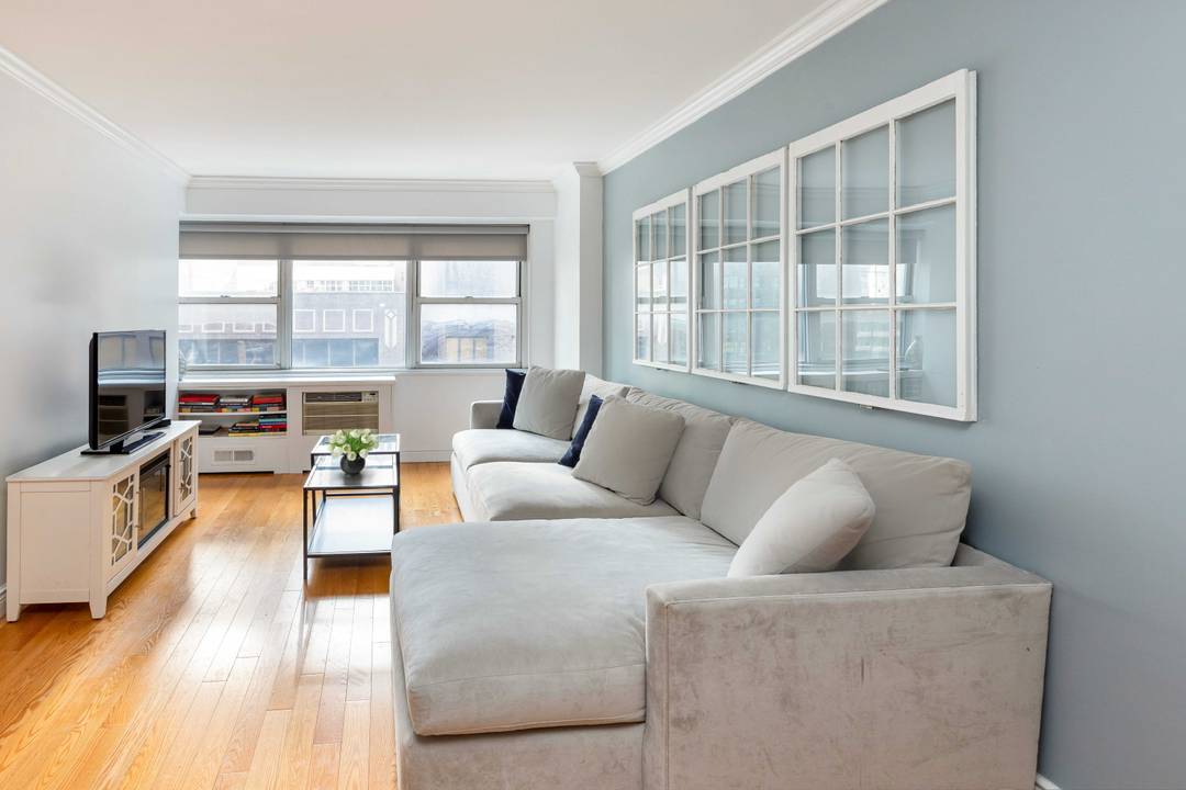 Experience refined city living in this beautifully renovated south facing home at the Gotham Town House.