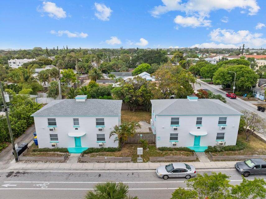 Corner lot multi family property with 2 buildings and eight 1 bed 1 bath 550 sq ft residential units.