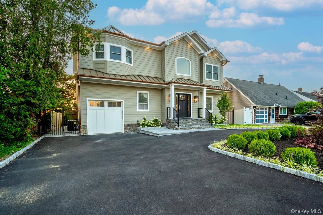 Introducing a stunning 2025 new construction residence, perfectly situated in the heart of Levittown and proudly located within the Island Trees School District.