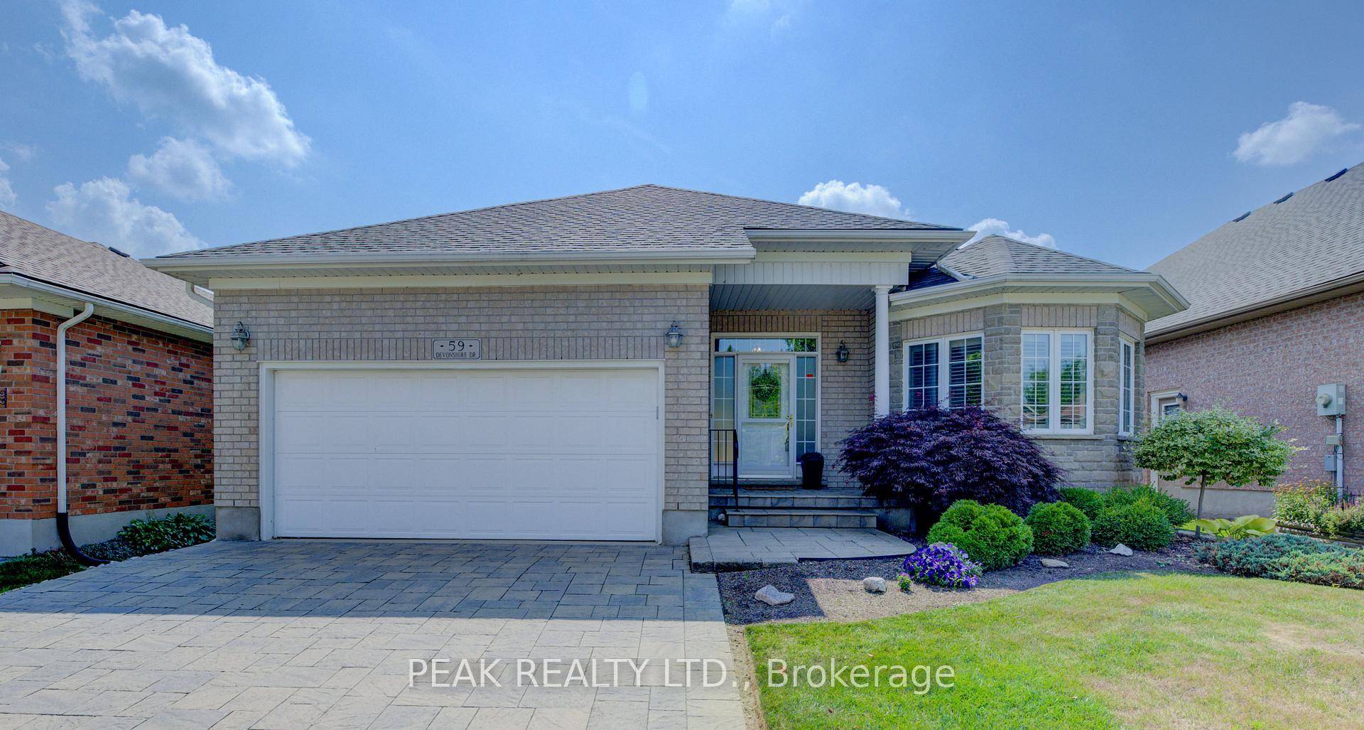 Welcome to 59 Devonshire Drive, a lovingly maintained Waterford Model offering two bedrooms plus a den, 2.